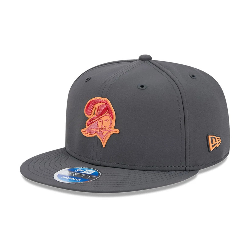 Pictured is this NFL Sideline 2026 Tampa Bay Buccaneers 9FIFTY Snapback cap in charcoal. 1
