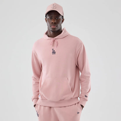 The model is wearing this MLB Midi League Essential LA Dodgers Oversized Pullover Hoodie in pastel pink. 3