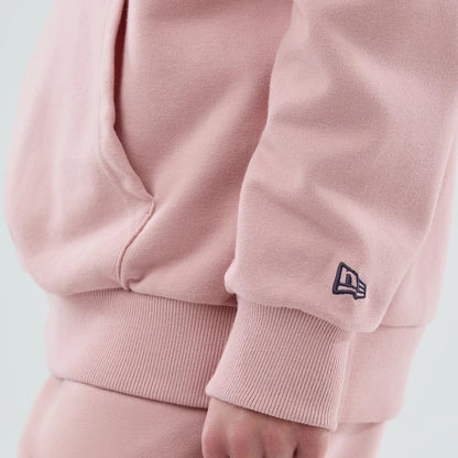 The model is wearing this MLB Midi League Essential LA Dodgers Oversized Pullover Hoodie in pastel pink. 7