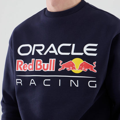 The model is wearing this Red Bull Racing Oversized Crew Neck Sweater in dark blue. 4