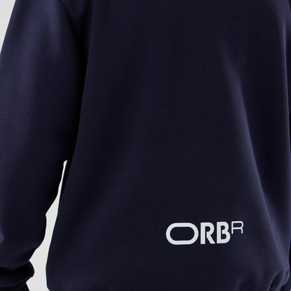 The model is wearing this Red Bull Racing Oversized Crew Neck Sweater in dark blue. 5