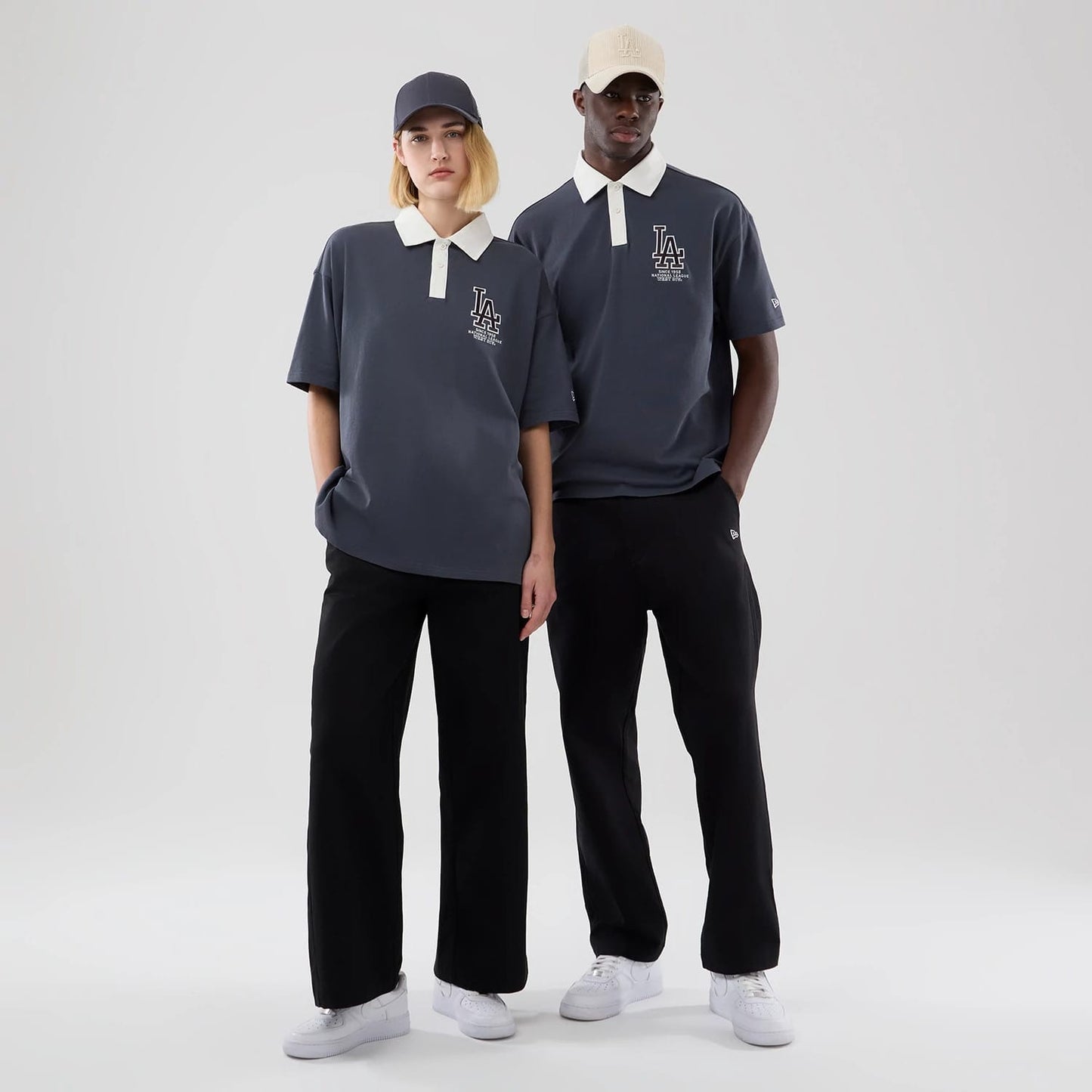 The model is wearing this MLB LA Dodgers Polo T-Shirt in grey. 1