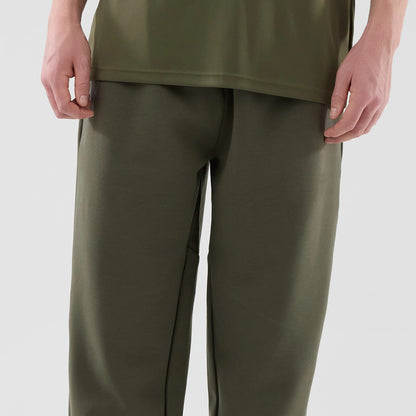 The model is wearing these MLB Core Plus New York Yankees Joggers in green. 3