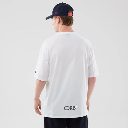 The model is wearing this Red Bull Racing Graphic Oversized T-Shirt in white. 2