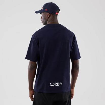 The model is wearing this Red Bull Racing Graphic Oversized T-Shirt in dark blue. 2