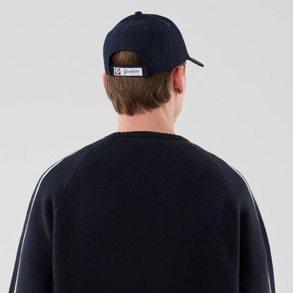 The model is wearing this MLB Knit New York Yankees Knitted Sweater in navy. 7