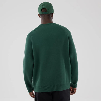 The model is wearing this MLB Knit LA Dodgers Knitted Sweater in dark green. 2