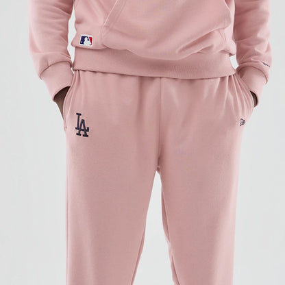 The model is wearing these MLB Midi League Essential LA Dodgers Joggers in pastel pink. 3