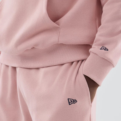 The model is wearing these MLB Midi League Essential LA Dodgers Joggers in pastel pink. 5