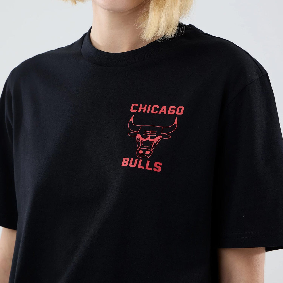 The model is wearing this NBA Court Graphic Chicago Bulls T-Shirt in black. 7