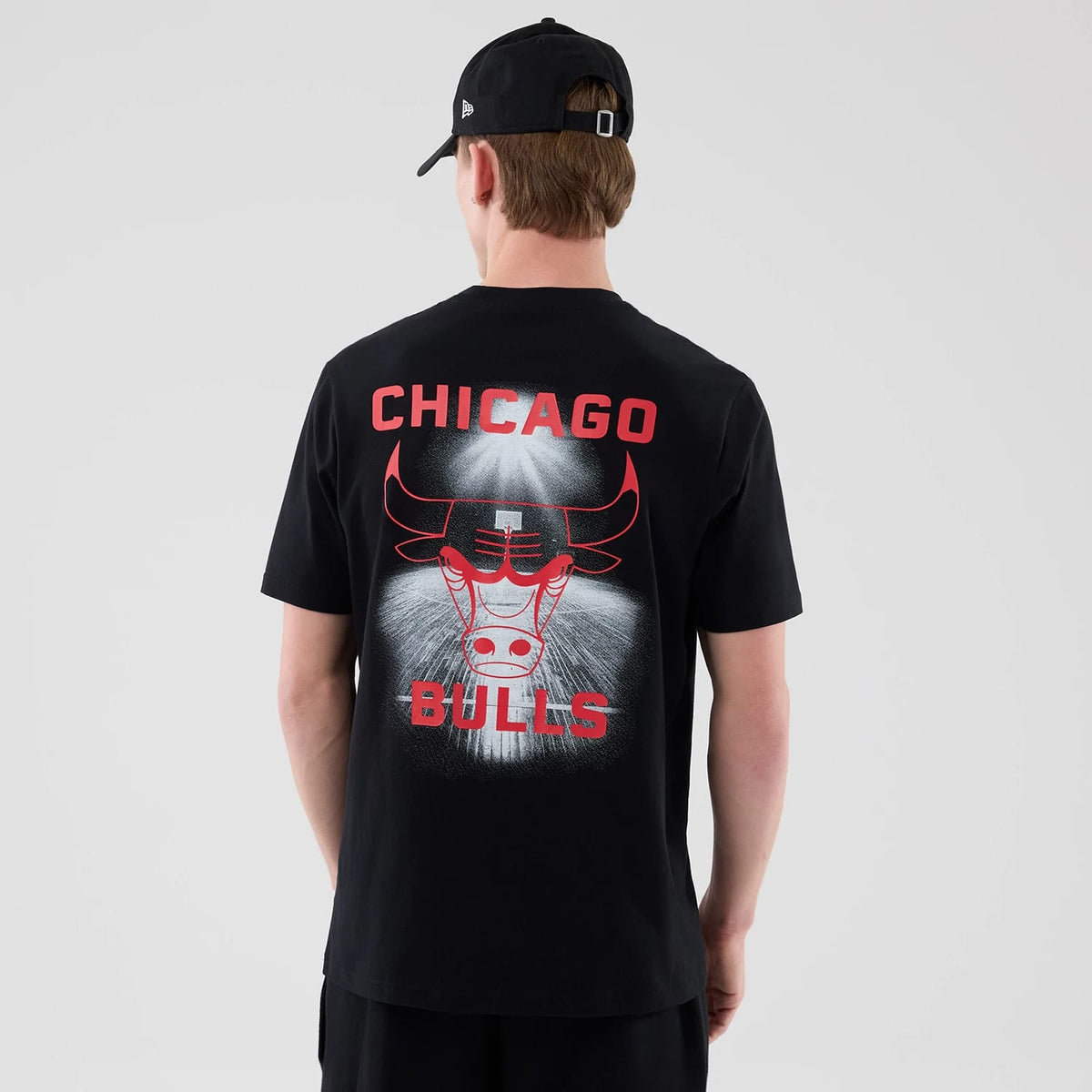 The model is wearing this NBA Court Graphic Chicago Bulls T-Shirt in black. 2