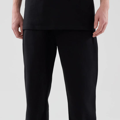 The model is wearing these New Era Tech Straight Leg Joggers in black. 3