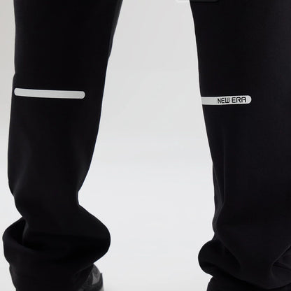 The model is wearing these New Era Tech Straight Leg Joggers in black. 4