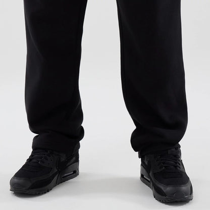 The model is wearing these New Era Tech Straight Leg Joggers in black. 6