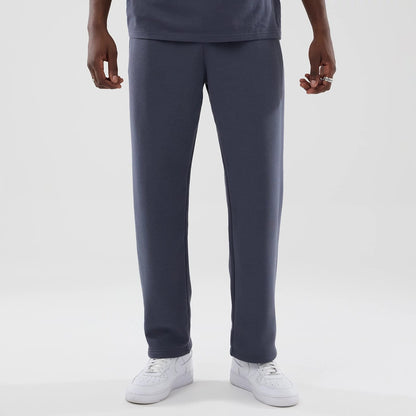 The model is wearing these New Era Tech Straight Leg Joggers in grey. 1