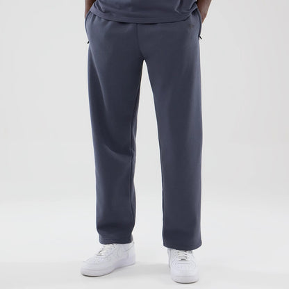 The model is wearing these New Era Tech Straight Leg Joggers in grey. 3