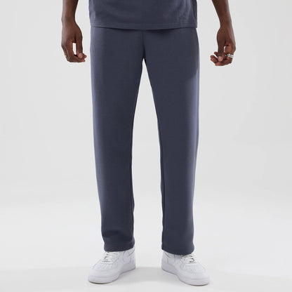 The model is wearing these New Era Tech Straight Leg Joggers in grey. 1
