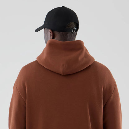 The model is wearing this NBA Core Plus Chicago Bulls Pullover Hoodie in brown. 7