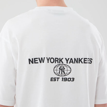 The model is wearing this MLB Logo Graphic New York Yankees Oversized T-Shirt in white. 7