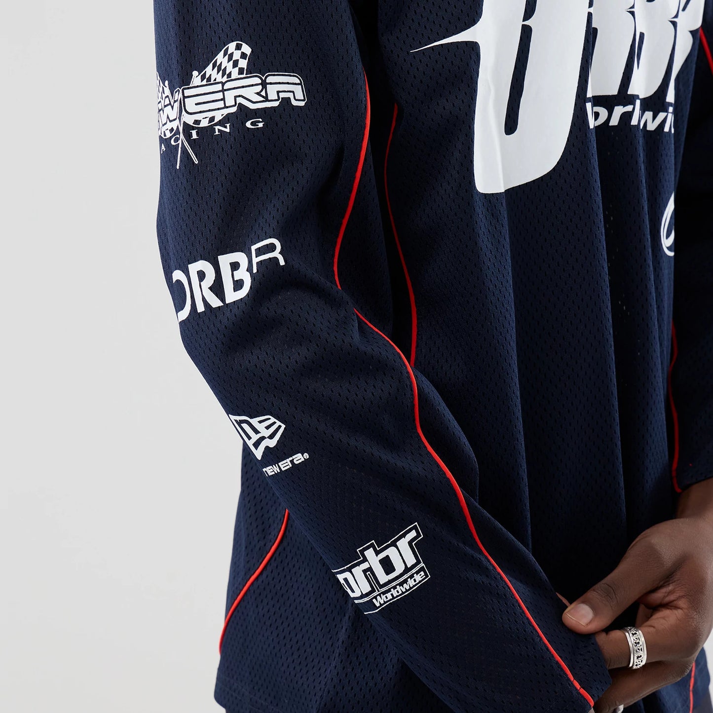 The model is wearing this Red Bull Racing Hockey Jersey in dark blue. 3