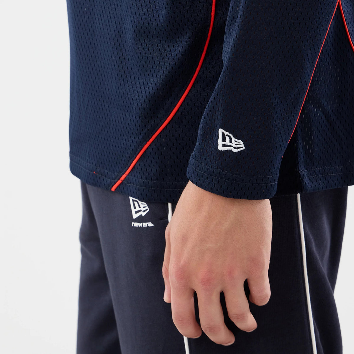 The model is wearing this Red Bull Racing Hockey Jersey in dark blue. 5