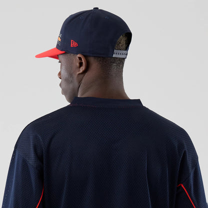 The model is wearing this Red Bull Racing Hockey Jersey in dark blue. 7