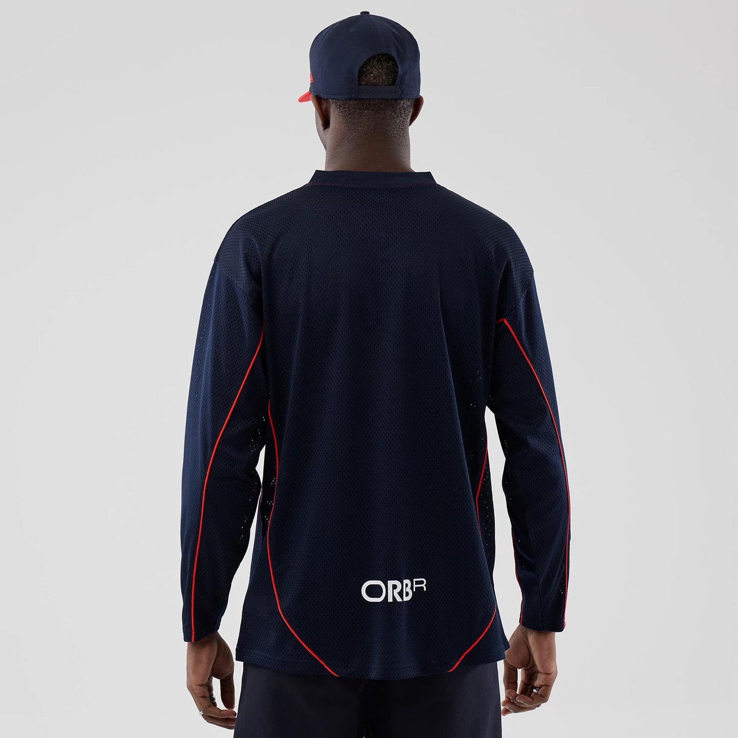 The model is wearing this Red Bull Racing Hockey Jersey in dark blue. 2