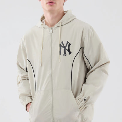 The model is wearing this MLB Piping New York Yankees Jacket in cream. 3