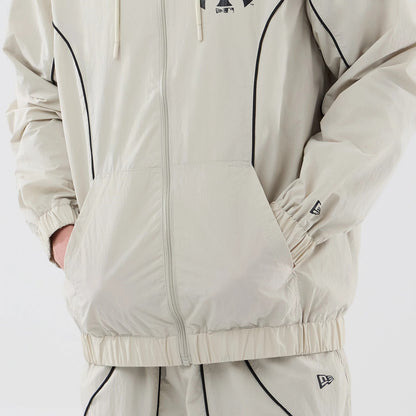 The model is wearing this MLB Piping New York Yankees Jacket in cream. 6