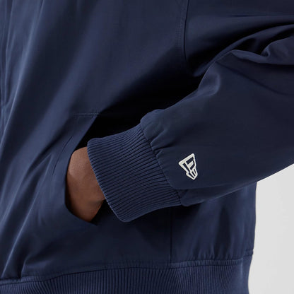 The model is wearing this MLB Collared New York Yankees Jacket in navy. 5