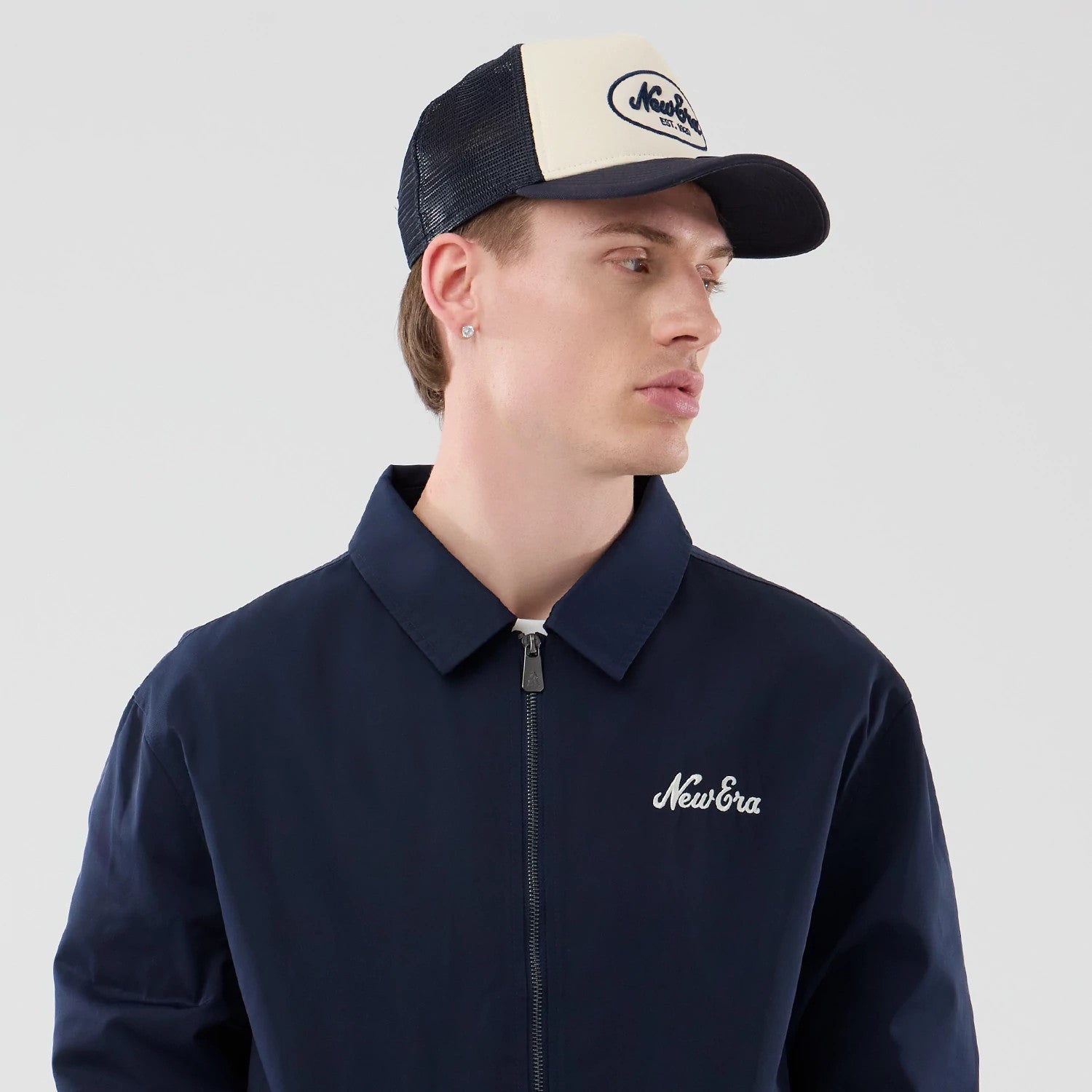 The model is wearing this New Era Shacket in navy. 3