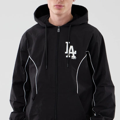 The model is wearing this MLB Piping LA Dodgers Jacket in black. 3
