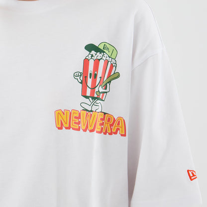 The model is wearing this New Era Baseball Popcorn Graphic Oversized T-Shirt in white. 6