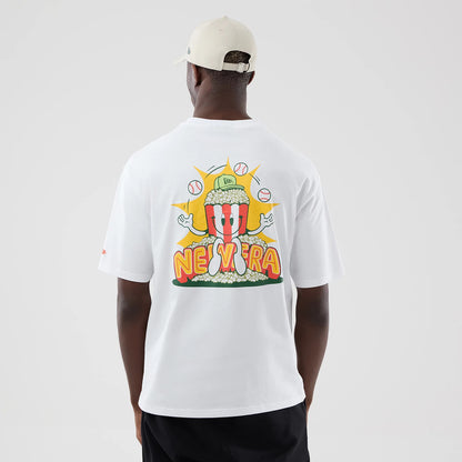 The model is wearing this New Era Baseball Popcorn Graphic Oversized T-Shirt in white. 2