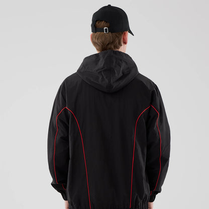 The model is wearing this Red Bull Racing Piping Track Jacket in black. 2