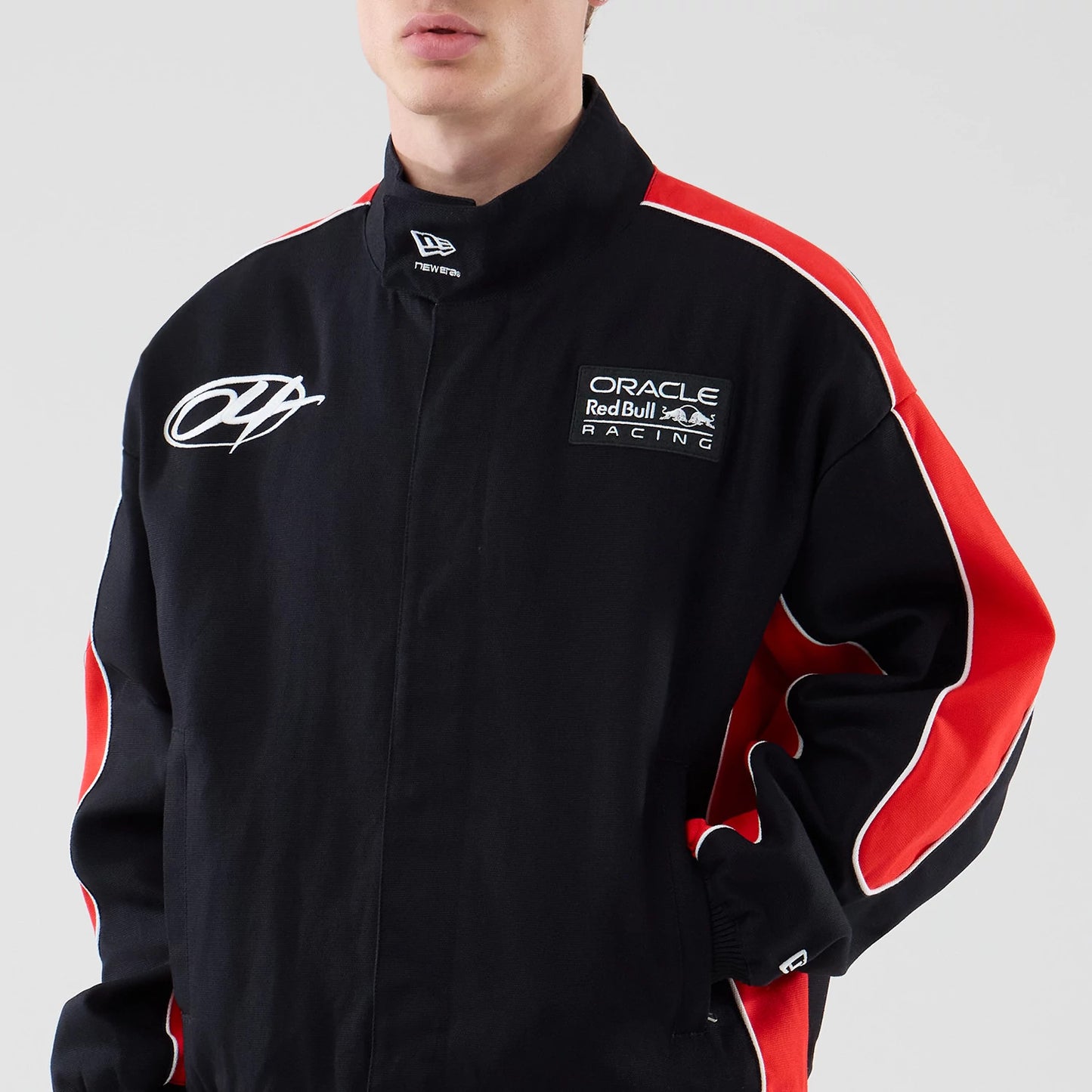 The model is wearing this Red Bull Racing Motorsport Jacket in black. 3