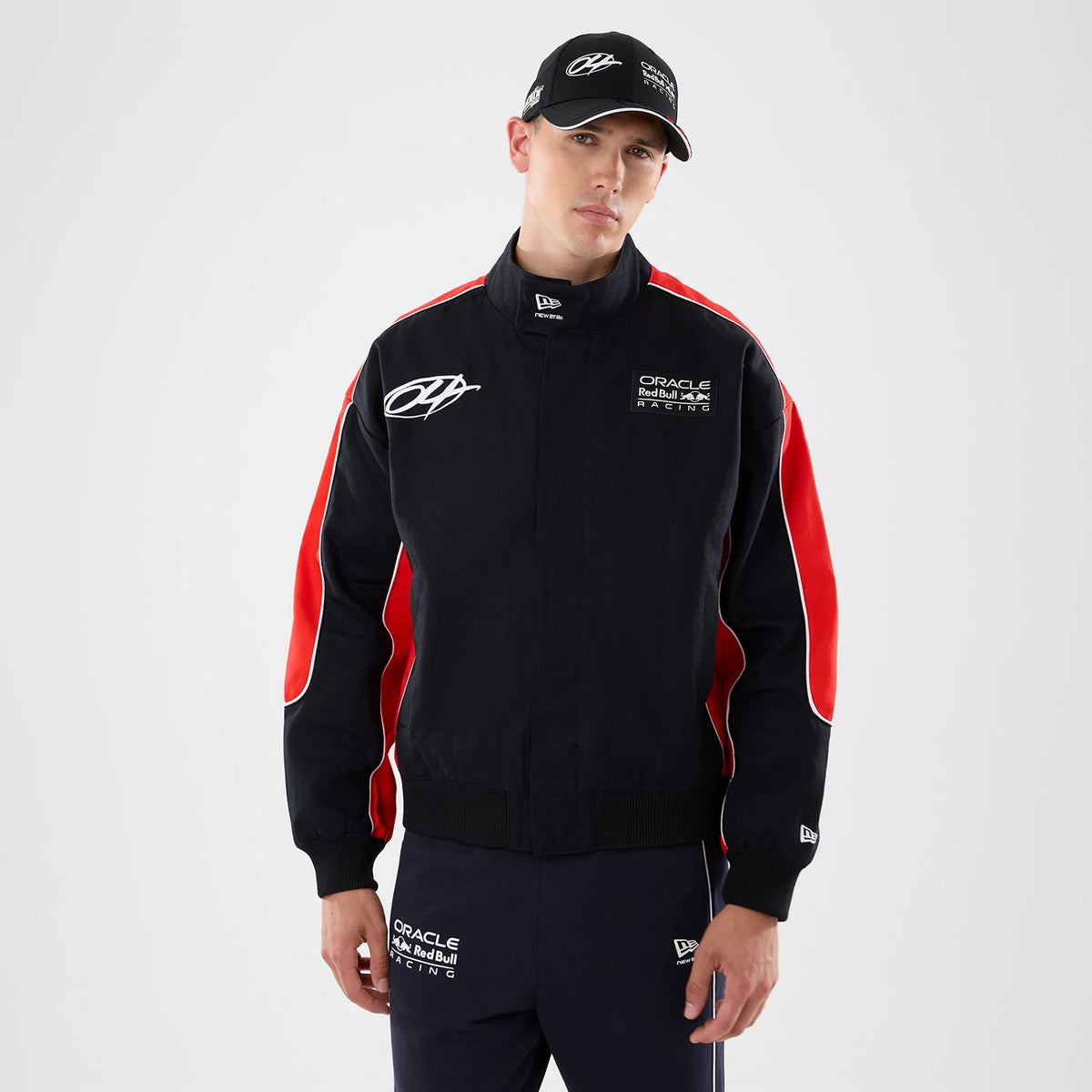 The model is wearing this Red Bull Racing Motorsport Jacket in black. 1