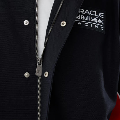 The model is wearing this Red Bull Racing Motorsport Jacket in black. 6