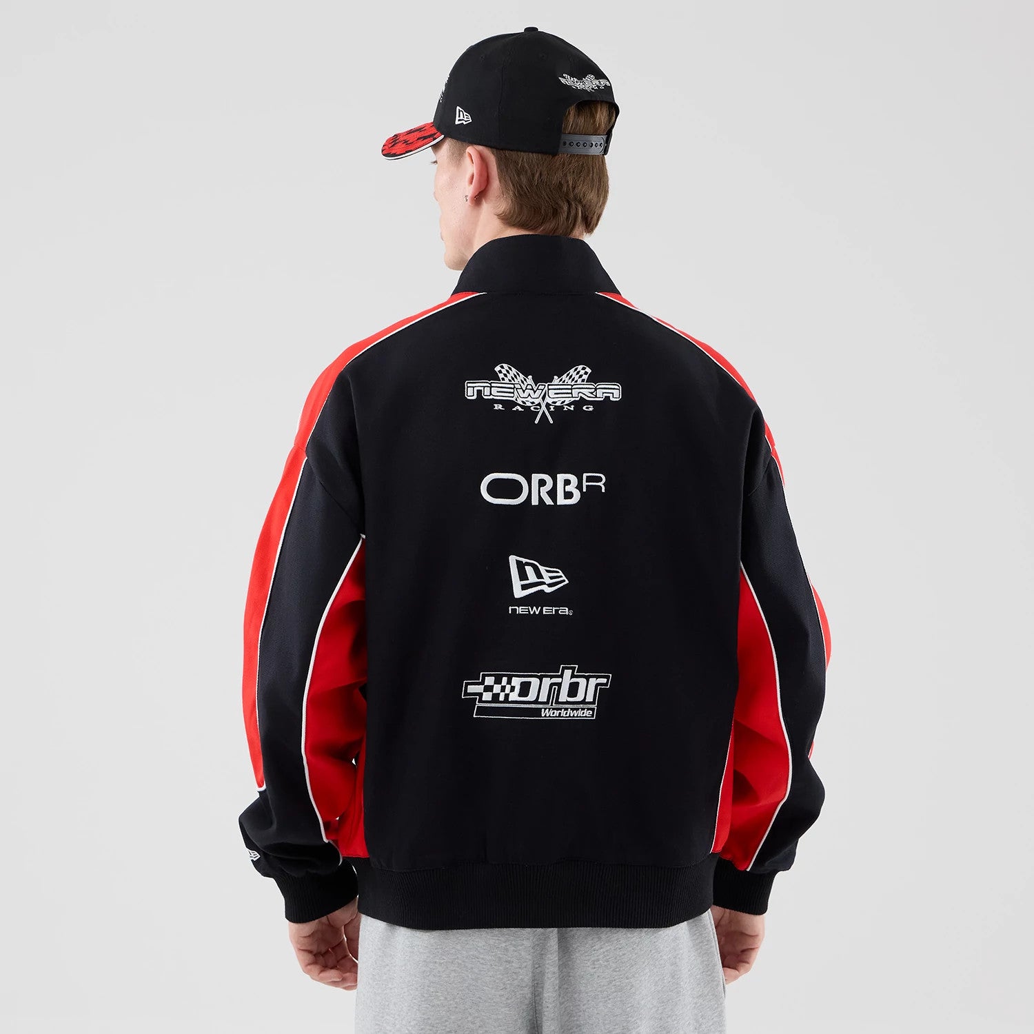 The model is wearing this Red Bull Racing Motorsport Jacket in black. 2