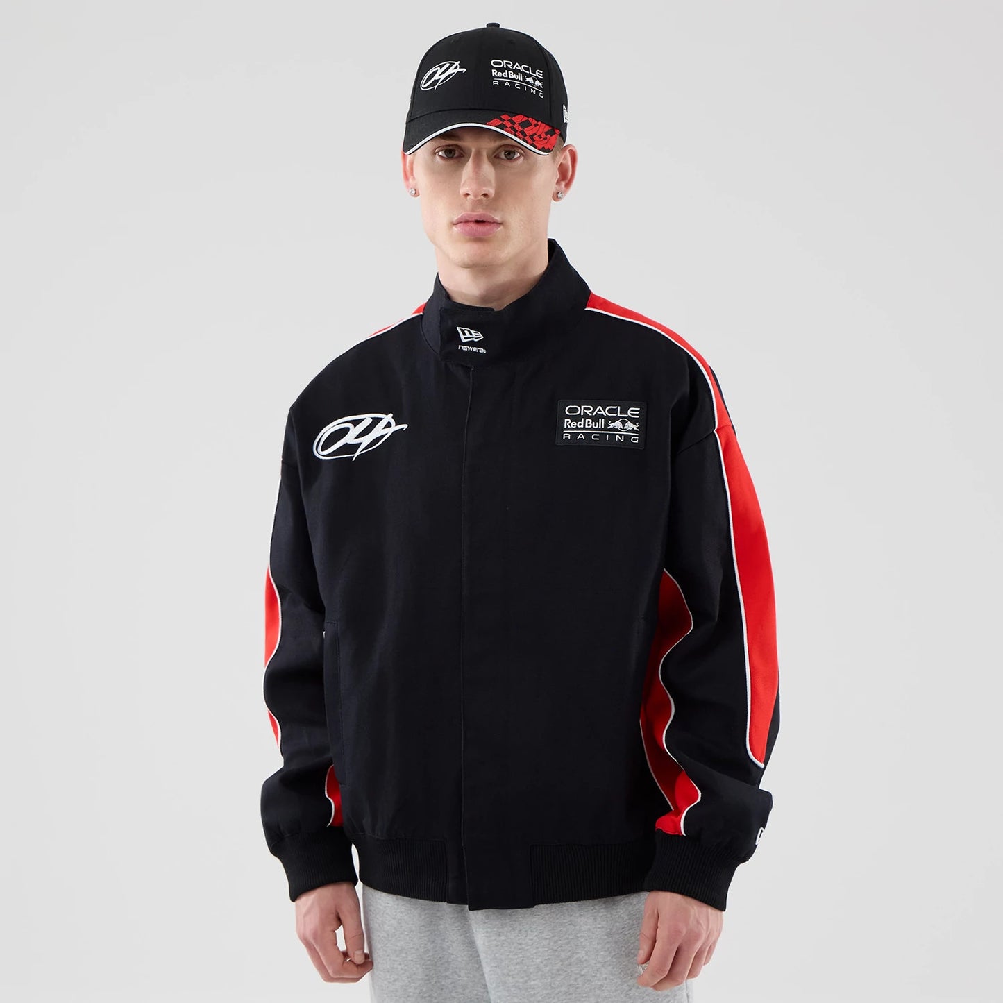 The model is wearing this Red Bull Racing Motorsport Jacket in black. 1