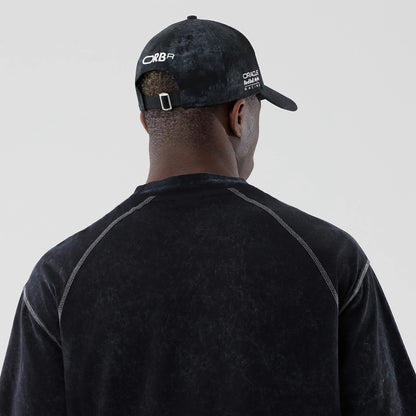 The model is wearing this Red Bull Racing Drop Shoulder T-Shirt in black. 7