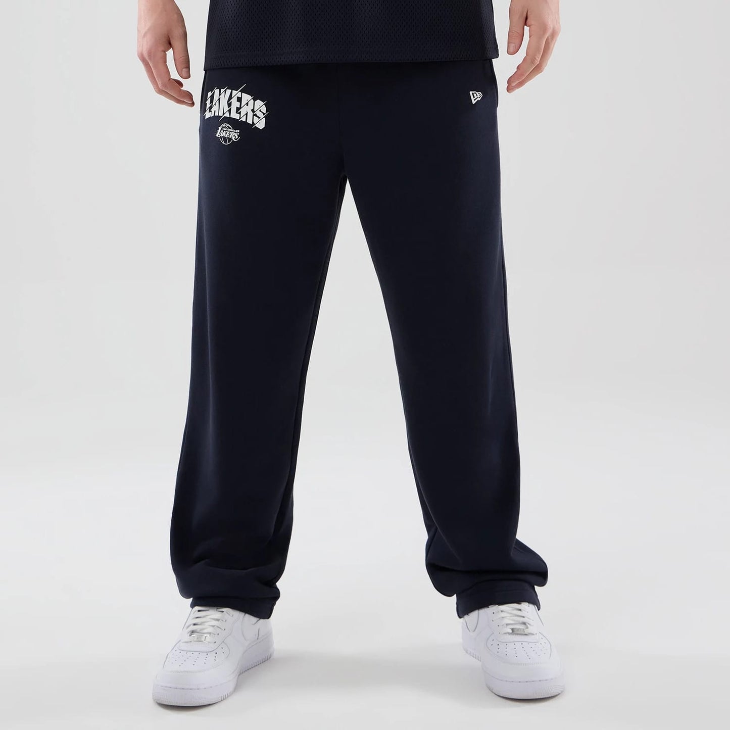 The model is wearing these NBA Core Plus LA Lakers Straight Leg Joggers in navy. 1