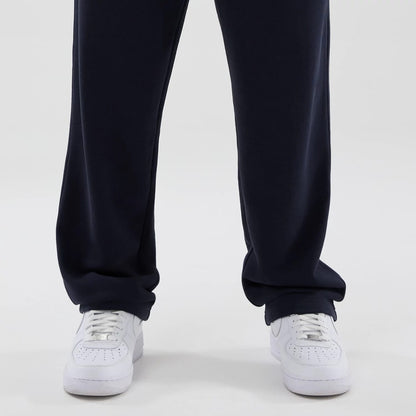 The model is wearing these NBA Core Plus LA Lakers Straight Leg Joggers in navy. 6