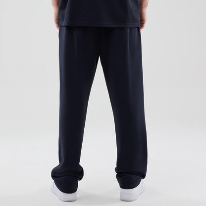 The model is wearing these NBA Core Plus LA Lakers Straight Leg Joggers in navy. 2