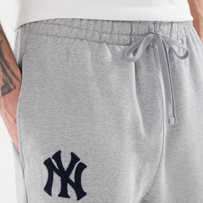 The model is wearing these MLB Straight Leg New York Yankees Straight Leg Joggers in grey. 3