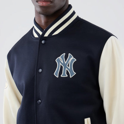 The model is wearing this MLB Jersey Bomber New York Yankees Jacket in navy. 5