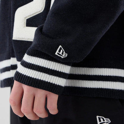 The model is wearing this New Era Heritage Cardigan in navy. 7