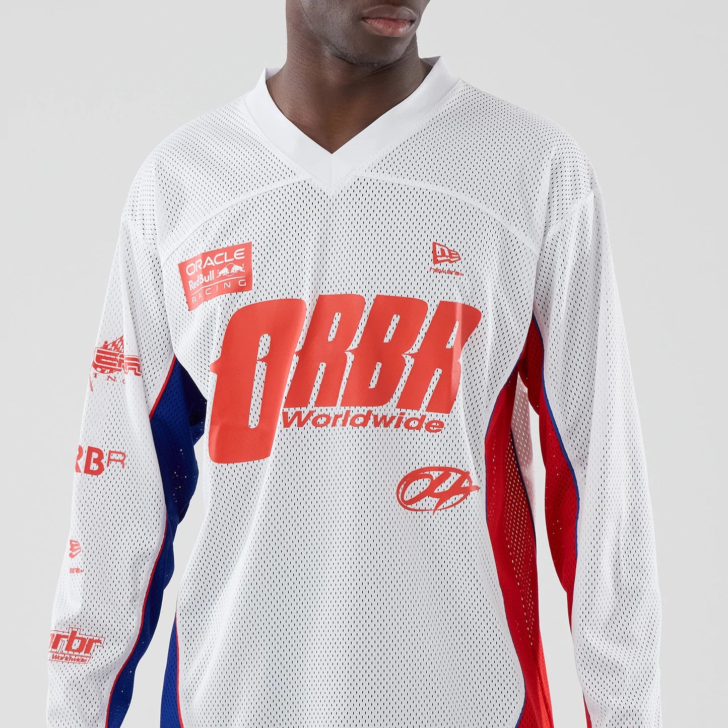 The model is wearing this Red Bull Racing Hockey Jersey in white. 3