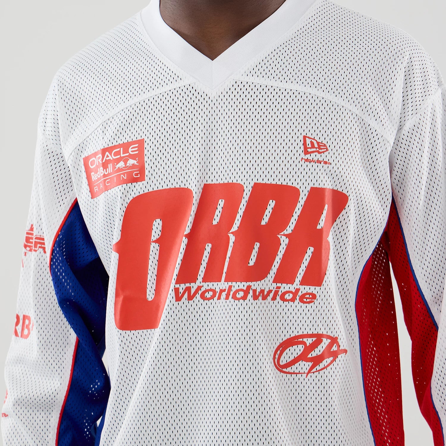 The model is wearing this Red Bull Racing Hockey Jersey in white. 4