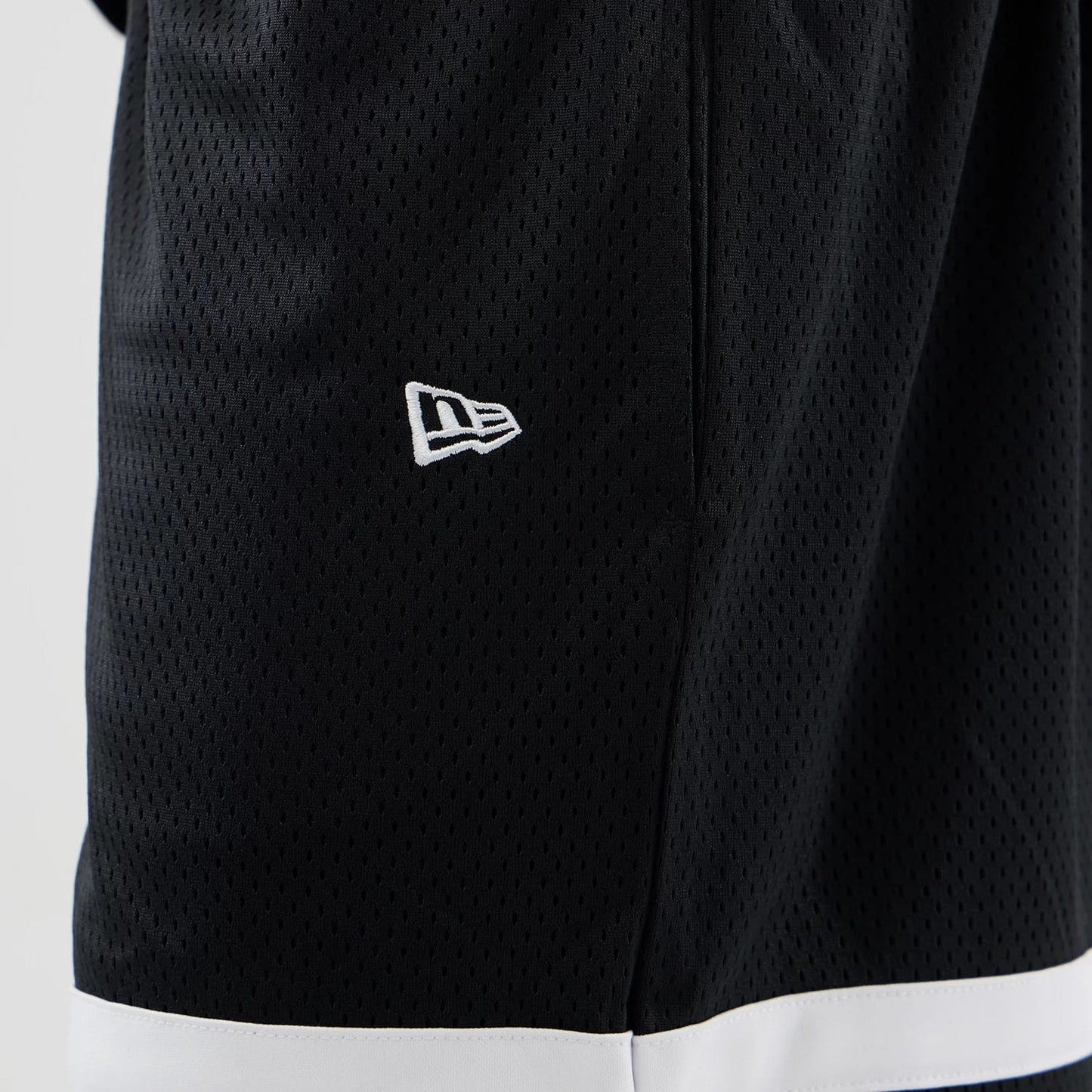 The model is wearing these MLB Mesh LA Dodgers Oversized Shorts in black. 5